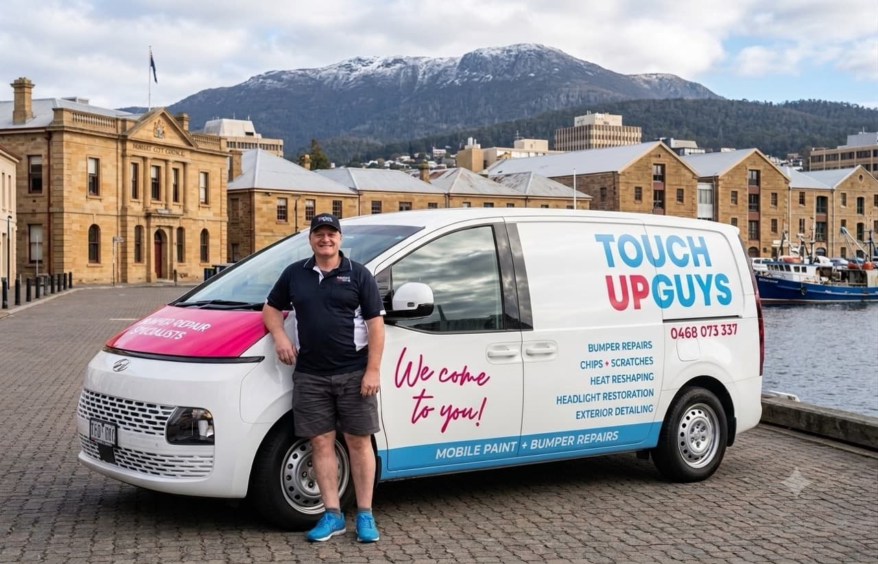Matthew Hibberd with his Touch Up Guys mobile repair van in Hobart